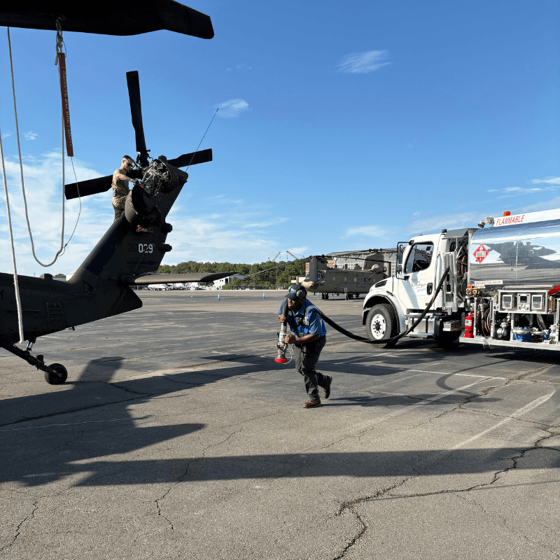 Army aircraft being fueled by jet fuel service at Chantilly Air.
