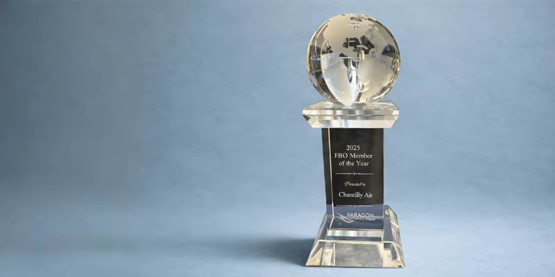 2025 FBO Member of the Year award presented to Chantilly Air by Paragon Aviation Group displayed on blue background