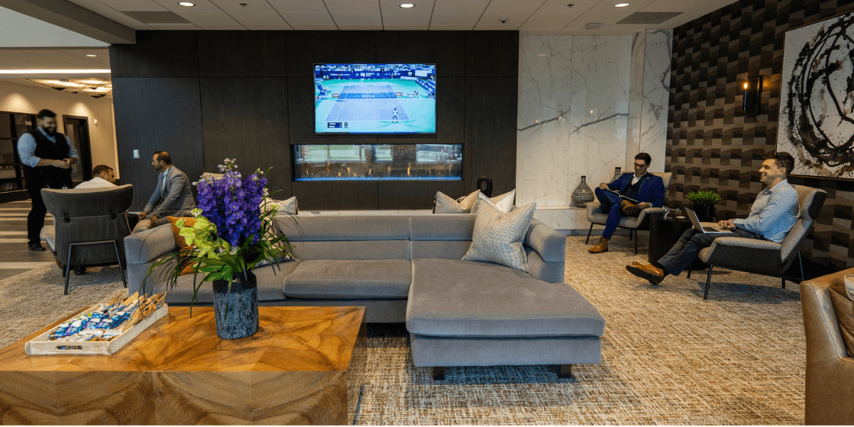 An inside look a Chantilly Air's brand new private pilot lounge area in the Fixed Base Operator and Jet Center with large flat screen TVs, couches and more.