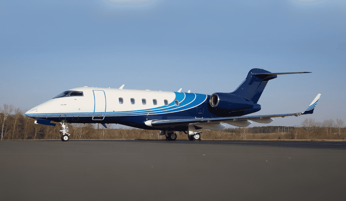 Blue and white Chantilly Air Challenger 300 aircraft on the runway