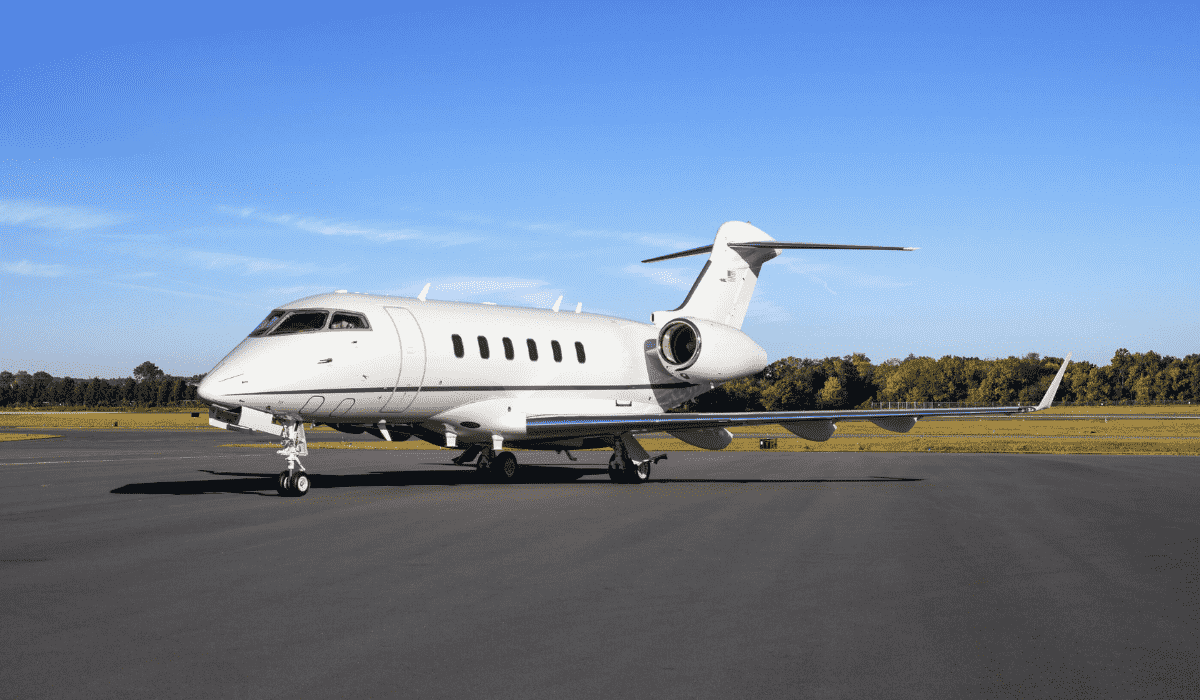 White Chantilly Air Challenger 300 aircraft on the runway