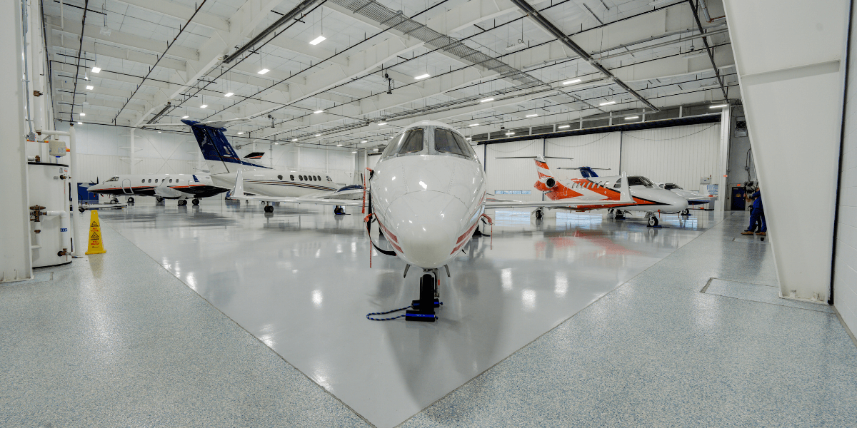 airplanes inside of Chantilly Airs hangar