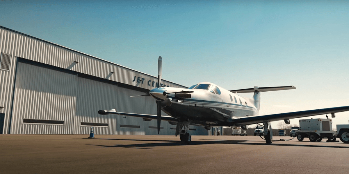 Chantilly Air Jet Center pictured in the background with private aircraft in front