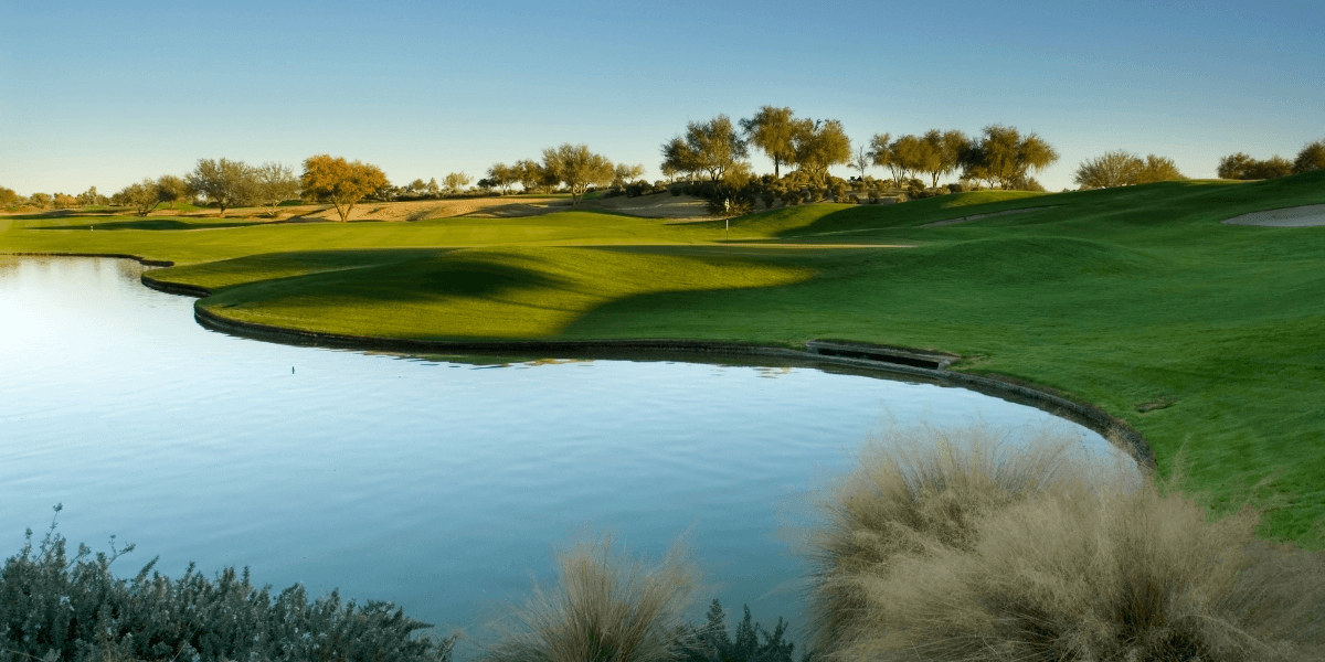 Lake overlooking a golf course.